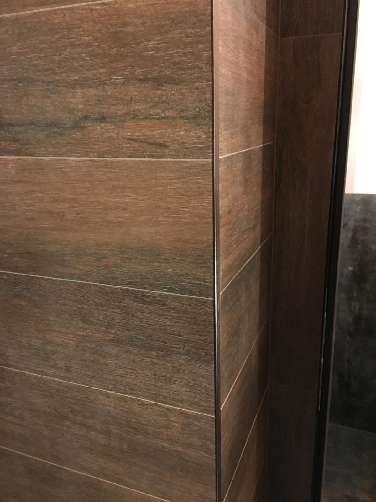 Precision wood-effect tile corner detail